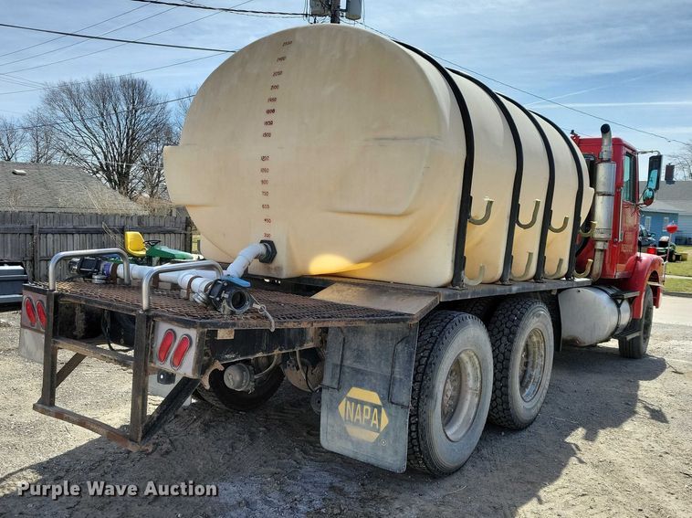 image for item NK9899 1990 White GMC WB water truck