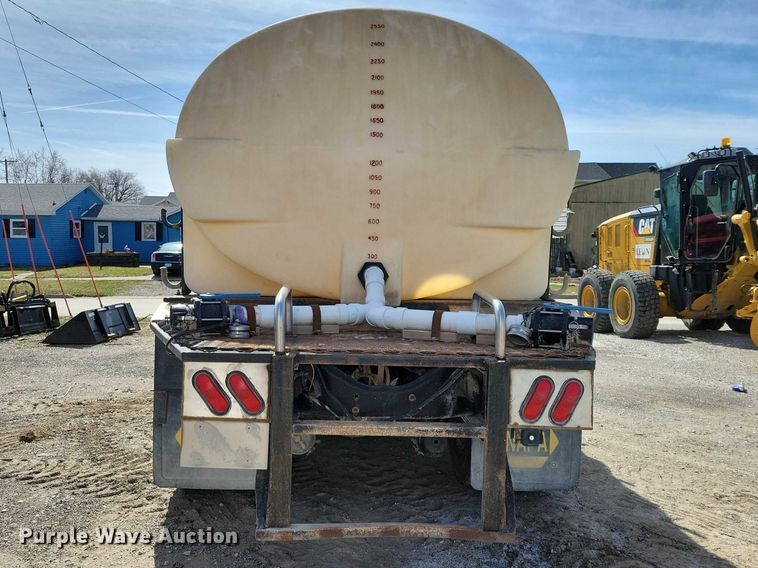 image for item NK9899 1990 White GMC WB water truck