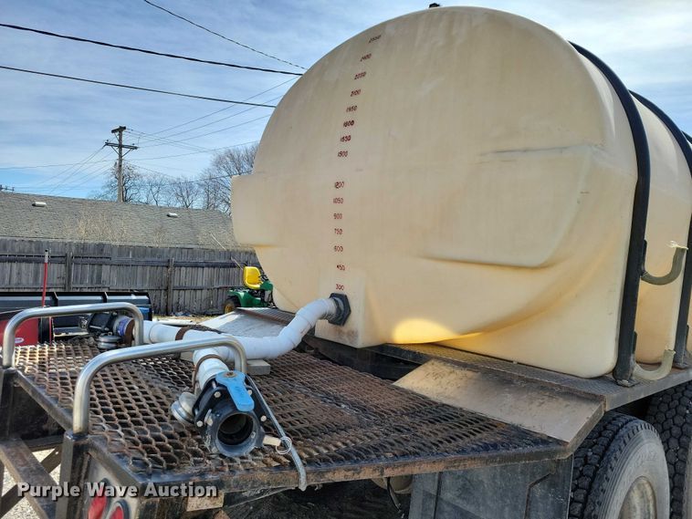 image for item NK9899 1990 White GMC WB water truck