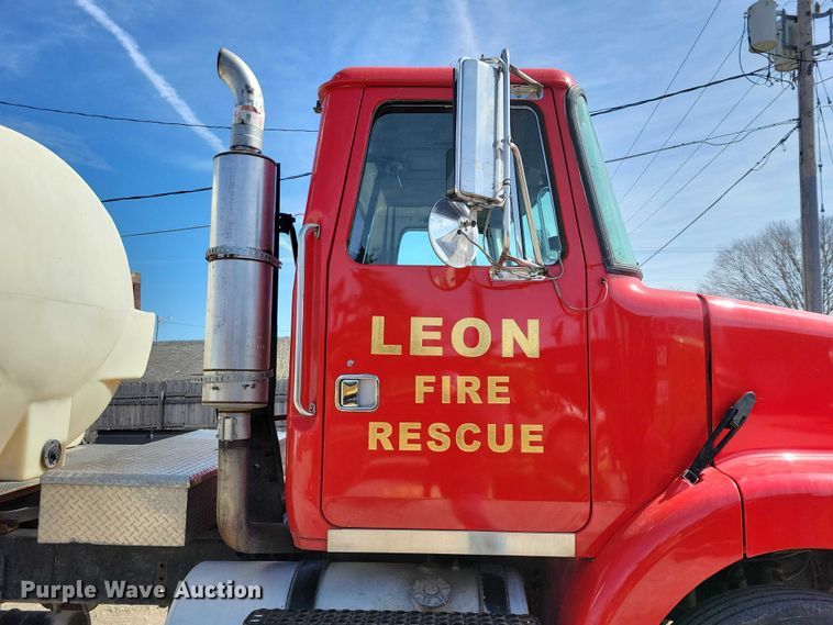 image for item NK9899 1990 White GMC WB water truck