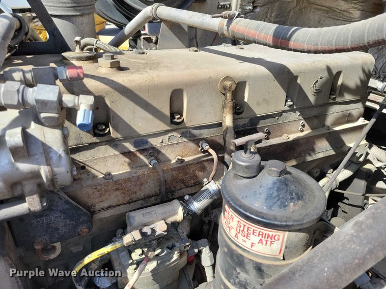 image for item NK9899 1990 White GMC WB water truck