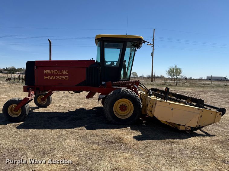 image for item DZ5346 2000 New Holland HW320 swather / windrower