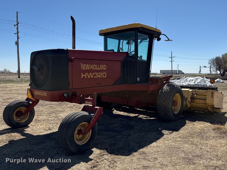 image for item DZ5346 2000 New Holland HW320 swather / windrower
