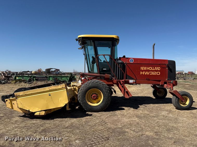 image for item DZ5346 2000 New Holland HW320 swather / windrower