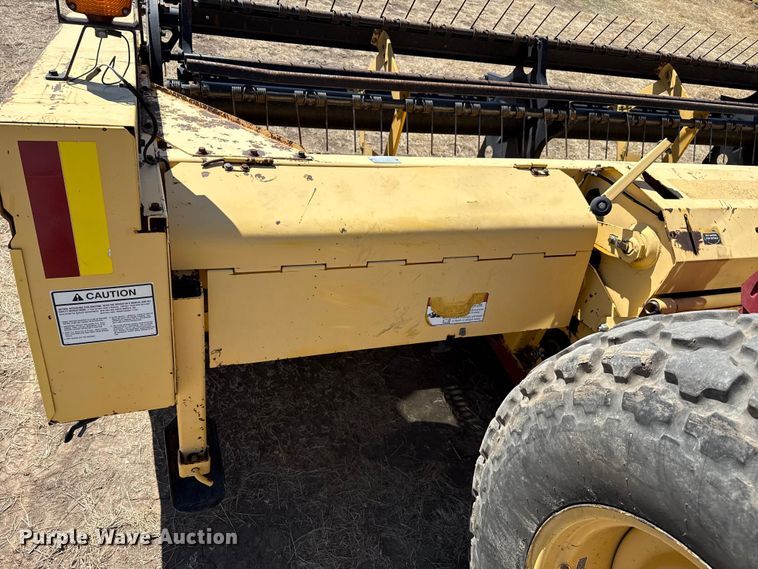 image for item DZ5346 2000 New Holland HW320 swather / windrower