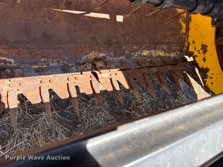 image for item DZ5346 2000 New Holland HW320 swather / windrower