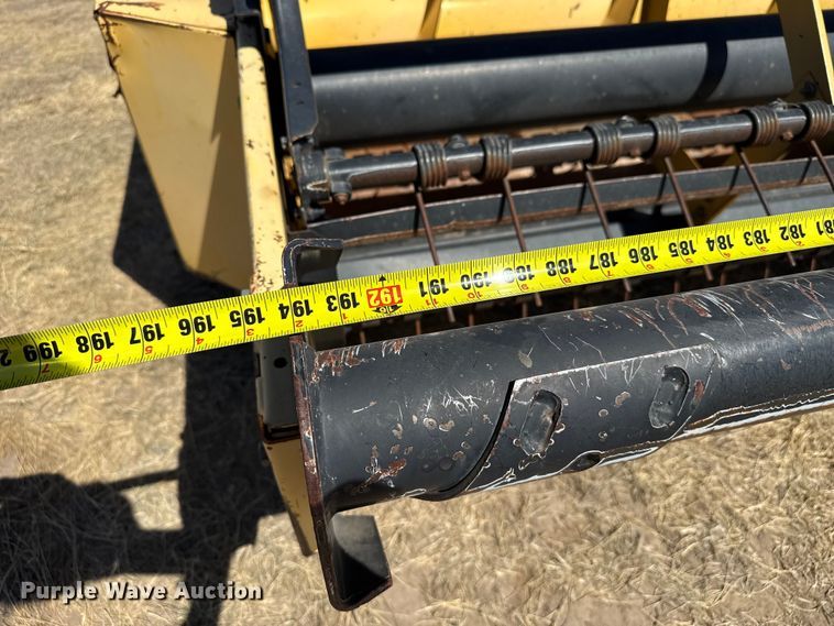 image for item DZ5346 2000 New Holland HW320 swather / windrower