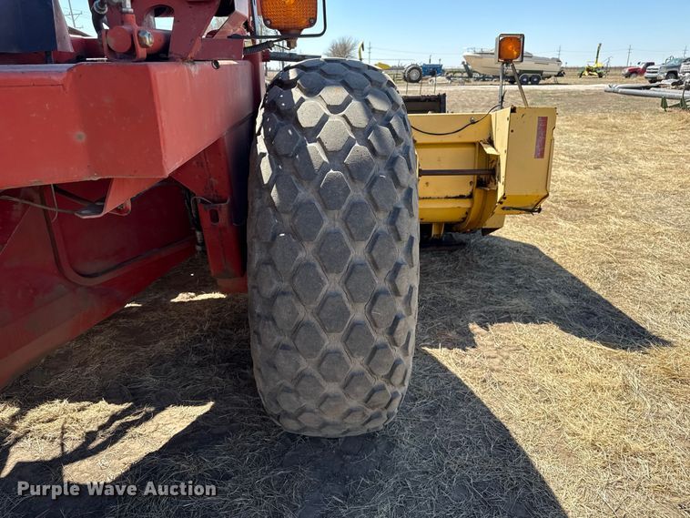 image for item DZ5346 2000 New Holland HW320 swather / windrower