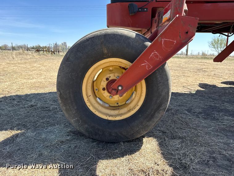 image for item DZ5346 2000 New Holland HW320 swather / windrower