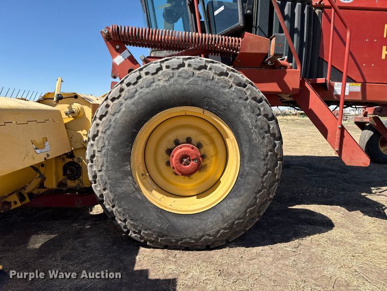 image for item DZ5346 2000 New Holland HW320 swather / windrower