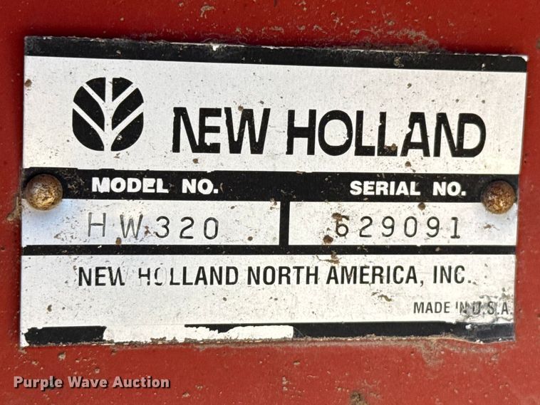image for item DZ5346 2000 New Holland HW320 swather / windrower