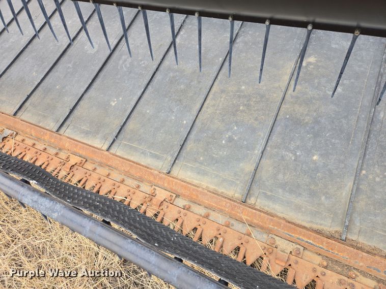 image for item EB1346 2009 Massey Ferguson 9430 swather / windrower