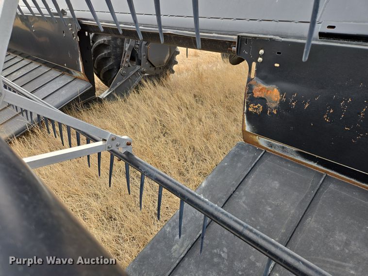 image for item EB1346 2009 Massey Ferguson 9430 swather / windrower