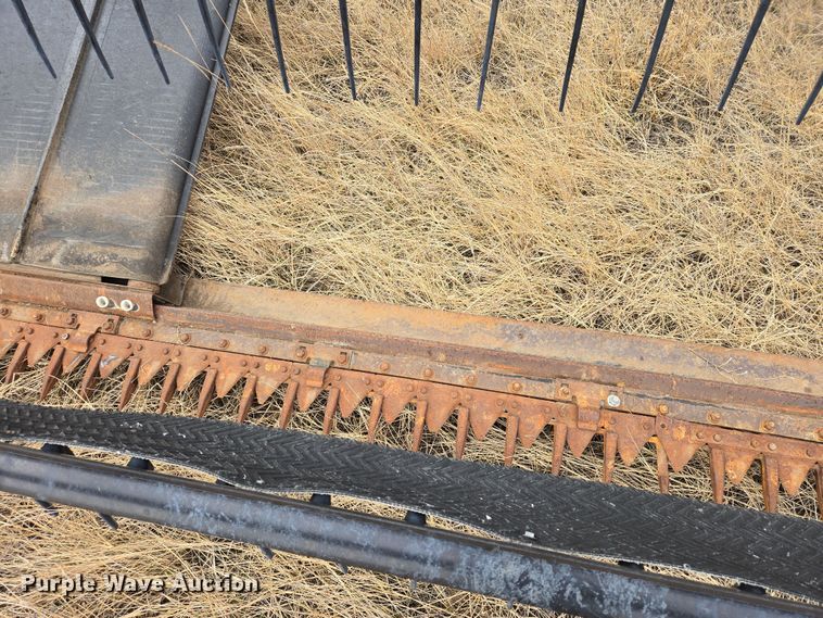 image for item EB1346 2009 Massey Ferguson 9430 swather / windrower