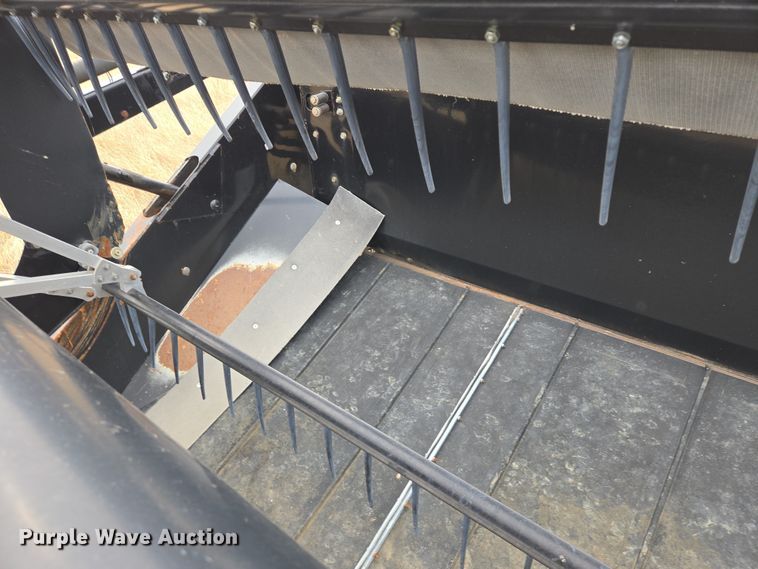 image for item EB1346 2009 Massey Ferguson 9430 swather / windrower