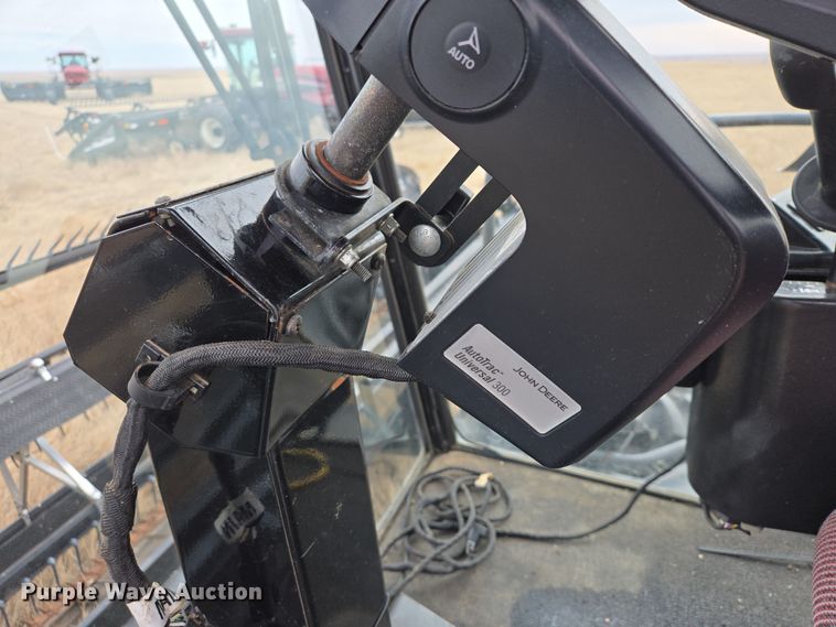 image for item EB1346 2009 Massey Ferguson 9430 swather / windrower