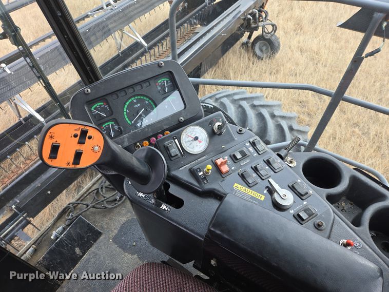 image for item EB1346 2009 Massey Ferguson 9430 swather / windrower