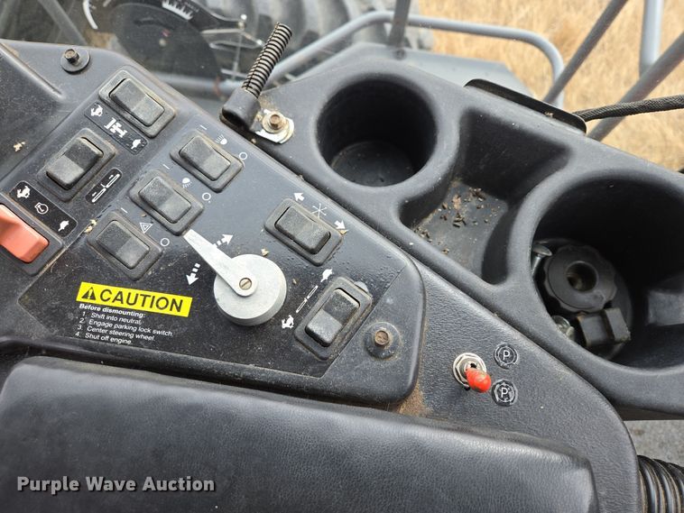 image for item EB1346 2009 Massey Ferguson 9430 swather / windrower