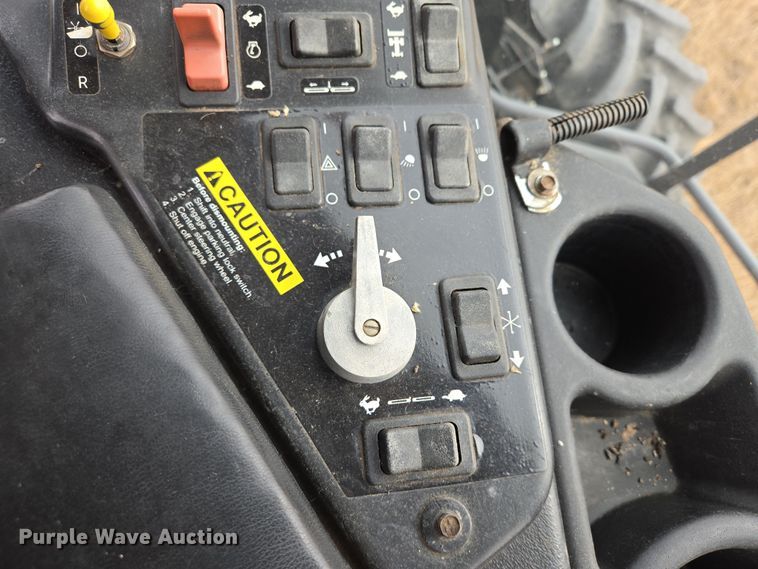 image for item EB1346 2009 Massey Ferguson 9430 swather / windrower