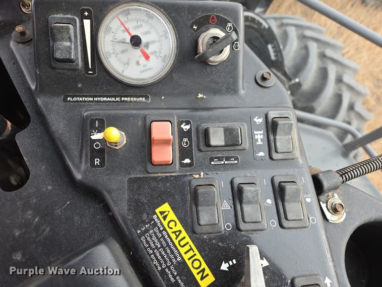 image for item EB1346 2009 Massey Ferguson 9430 swather / windrower