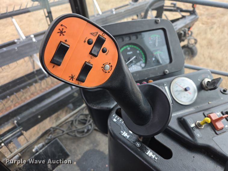 image for item EB1346 2009 Massey Ferguson 9430 swather / windrower