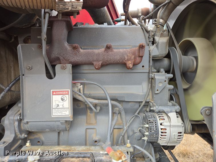 image for item EB1346 2009 Massey Ferguson 9430 swather / windrower