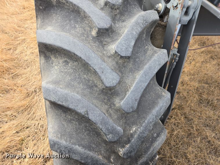 image for item EB1346 2009 Massey Ferguson 9430 swather / windrower