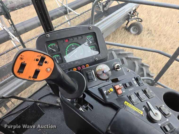 image for item EB1347 2009 Masey Ferguson 9430 swather / windrower