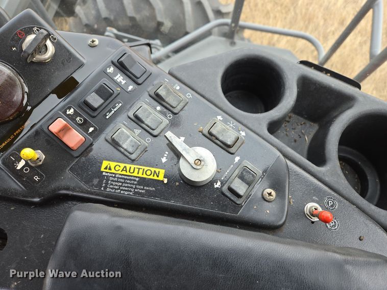 image for item EB1347 2009 Masey Ferguson 9430 swather / windrower