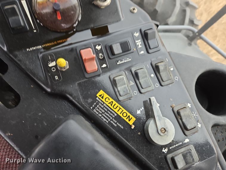 image for item EB1347 2009 Masey Ferguson 9430 swather / windrower