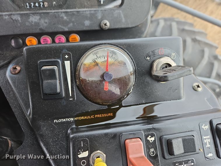 image for item EB1347 2009 Masey Ferguson 9430 swather / windrower