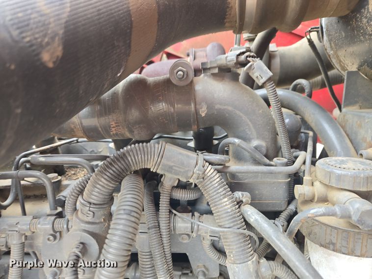 image for item EB1347 2009 Masey Ferguson 9430 swather / windrower