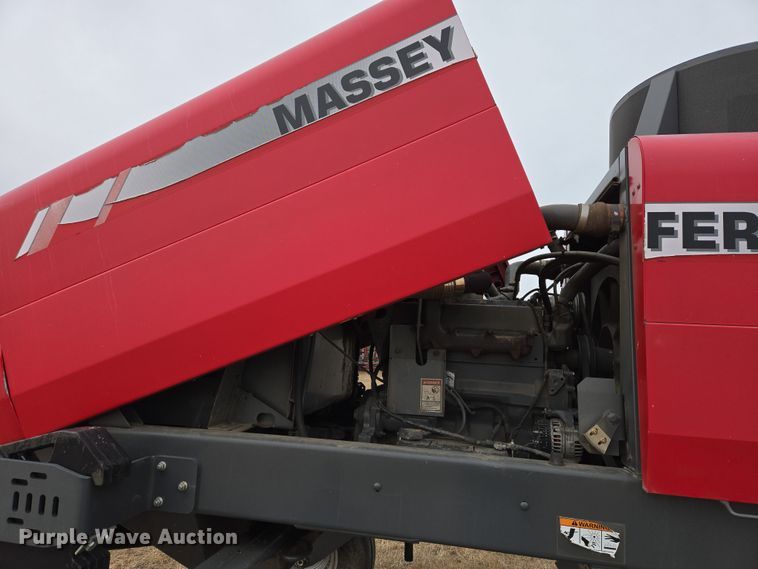 image for item EB1347 2009 Masey Ferguson 9430 swather / windrower