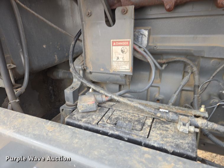 image for item EB1347 2009 Masey Ferguson 9430 swather / windrower