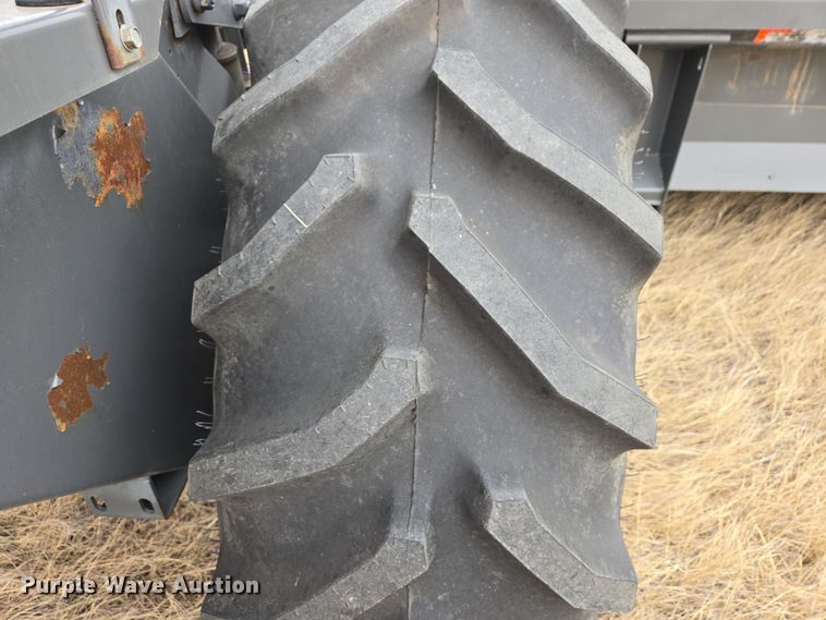 image for item EB1347 2009 Masey Ferguson 9430 swather / windrower