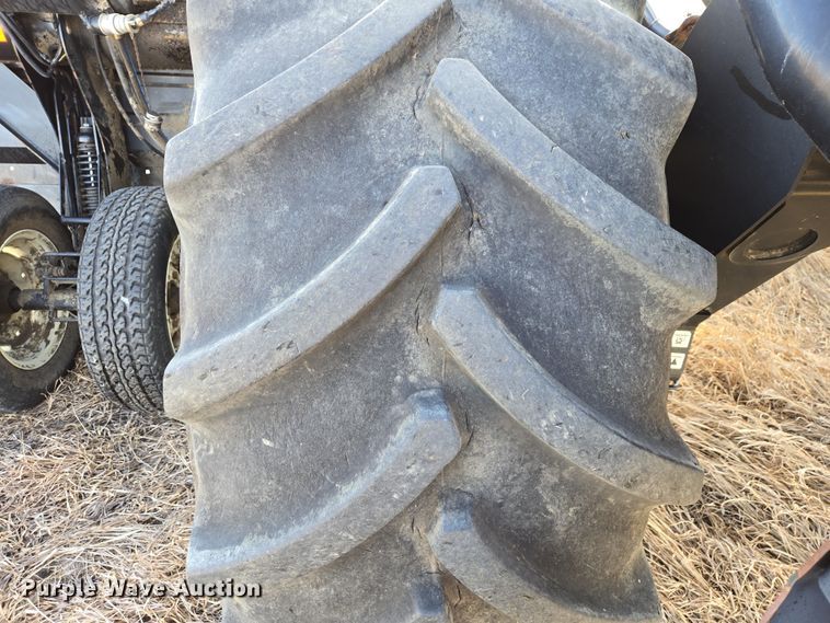 image for item EB1348 2008 MacDon M150 Premier swather / windrower