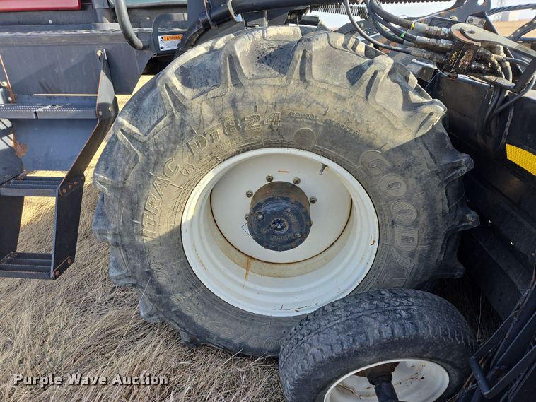 image for item EB1348 2008 MacDon M150 Premier swather / windrower