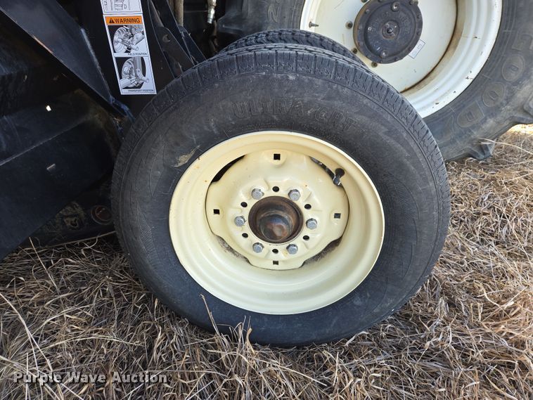 image for item EB1348 2008 MacDon M150 Premier swather / windrower