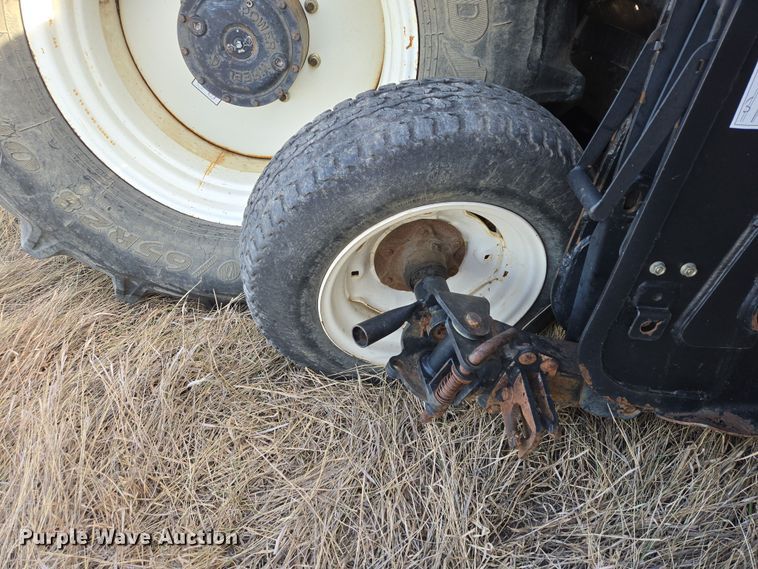 image for item EB1348 2008 MacDon M150 Premier swather / windrower