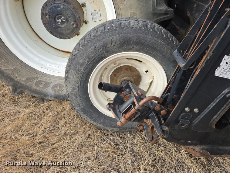 image for item EB1349 2008 Macdon Westward M150 swather / windrower