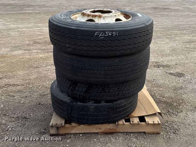 (4) 295/75R22.5 tires and wheels