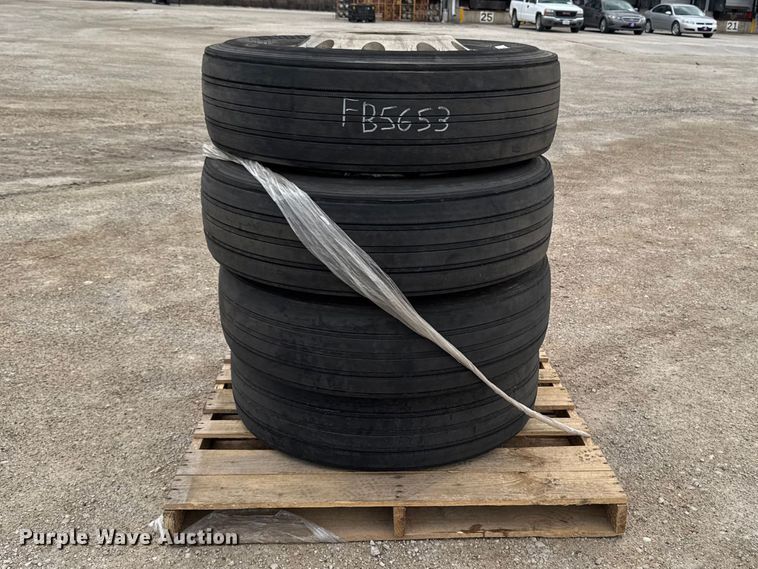 (4) Bridgestone 295/75R22.5 tires and wheels