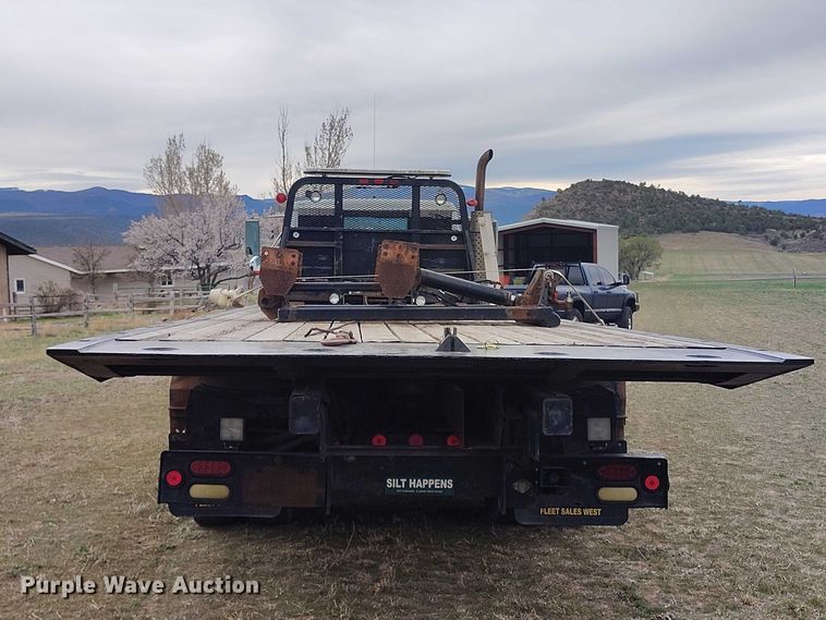 image for item DT0997 1999 International 4900 rollback truck