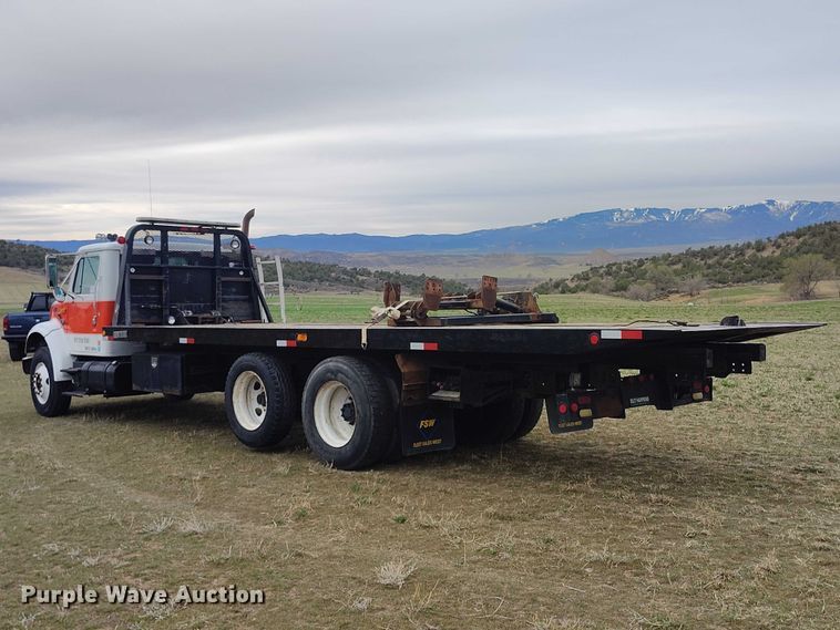 image for item DT0997 1999 International 4900 rollback truck