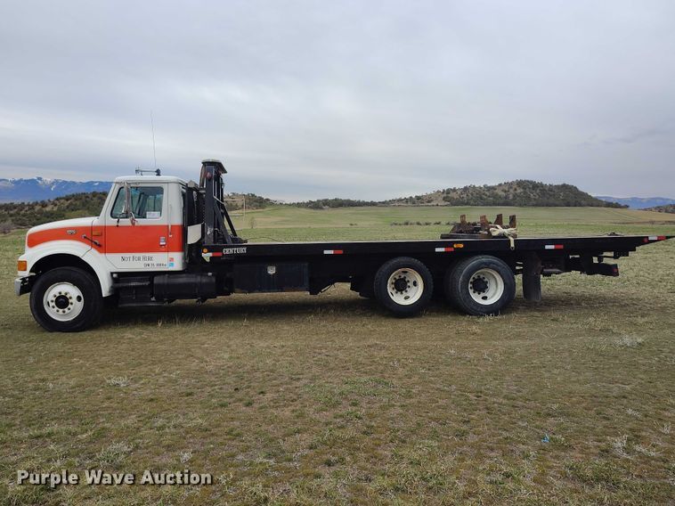 image for item DT0997 1999 International 4900 rollback truck