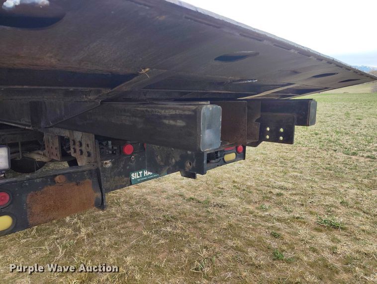 image for item DT0997 1999 International 4900 rollback truck