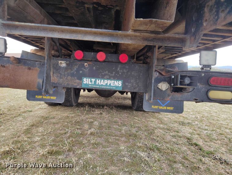 image for item DT0997 1999 International 4900 rollback truck