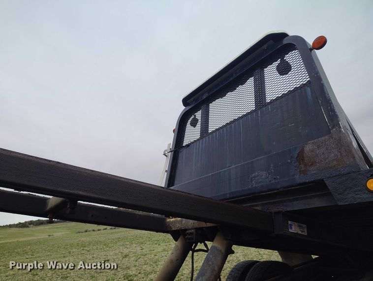 image for item DT0997 1999 International 4900 rollback truck