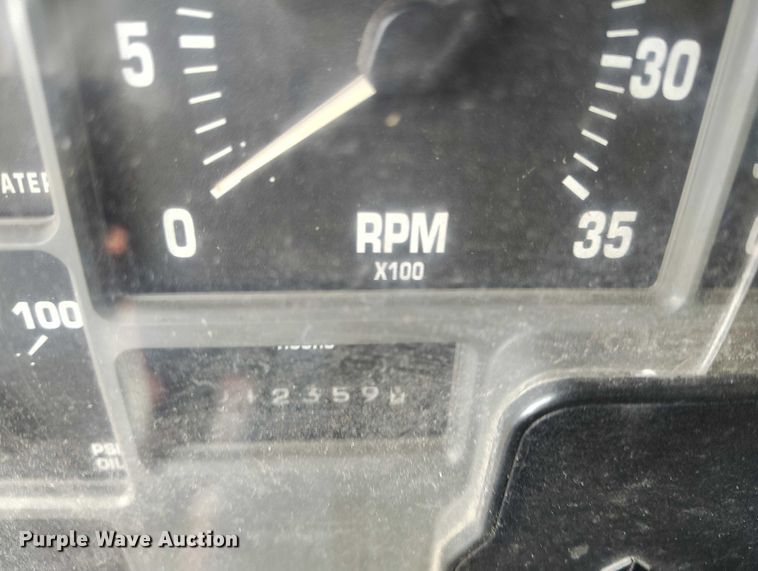 image for item DT0997 1999 International 4900 rollback truck