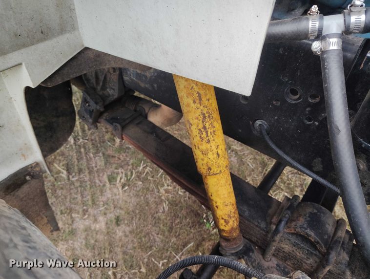 image for item DT0997 1999 International 4900 rollback truck